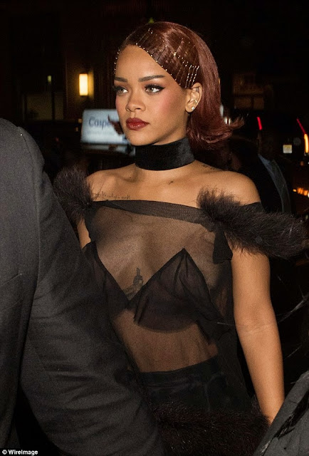 Rihanna nip-slip at a party