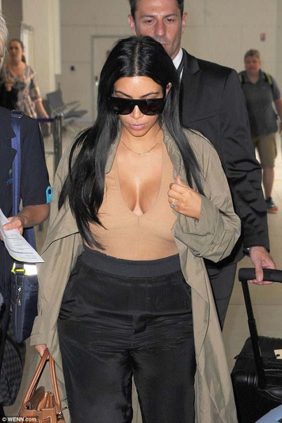 Kim Kardashian Flaunts First Glimpse Of Baby Bump In Bodysuit