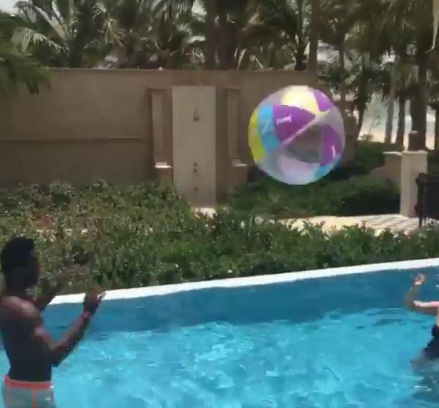 Mikel Obi and his girlfriend take a swim in Dubai