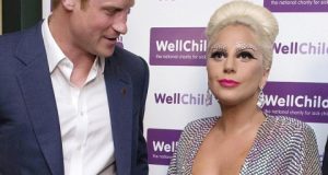 Prince Harry caught stealing a look at Lady Gaga's 'boobs'