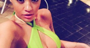 Rita Ora Flaunts Cleavage