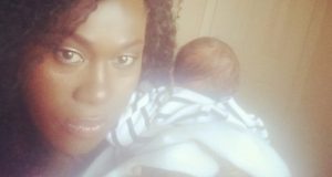 Uche Jumbo poses with her son