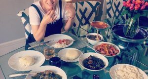 Olga Diyachenko eating Pounded yam