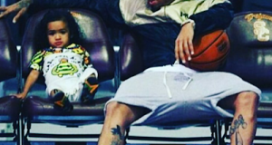 Chris Brown takes daughter Royalty to basketball game