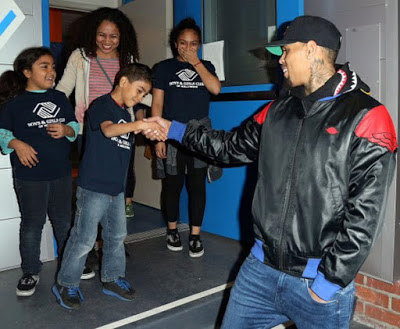 Chris Brown gifts family with a car and gifts for Christmas