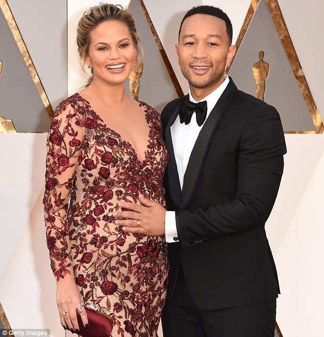 John Legend and wife