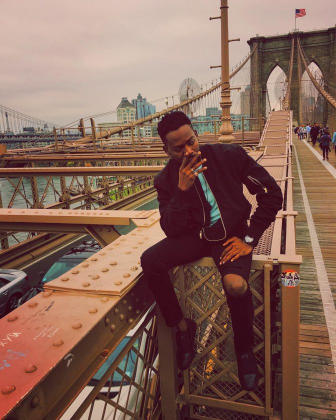 Adekunle Gold Takes Dapper Photo At Brooklyn Bridge