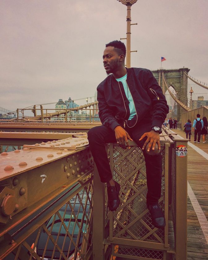 Adekunle Gold Takes Dapper Photos At Brooklyn Bridge In New York