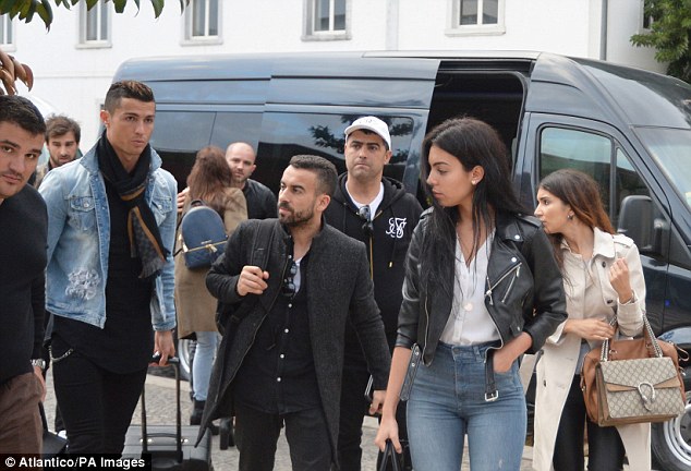 Cristiano Ronaldo and girlfriend mobbed by fans as they visit his CR7 hotel