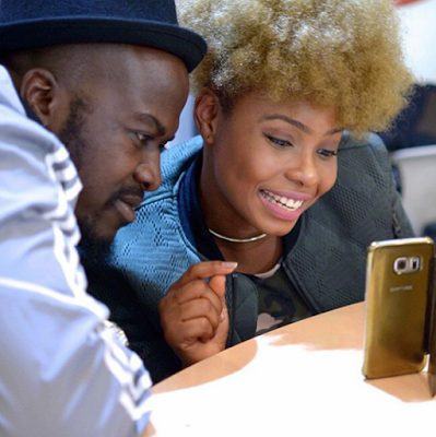 Yemi Alade & Her Manager Taiye Aliyu Get Cuddly & Romantic In Paris