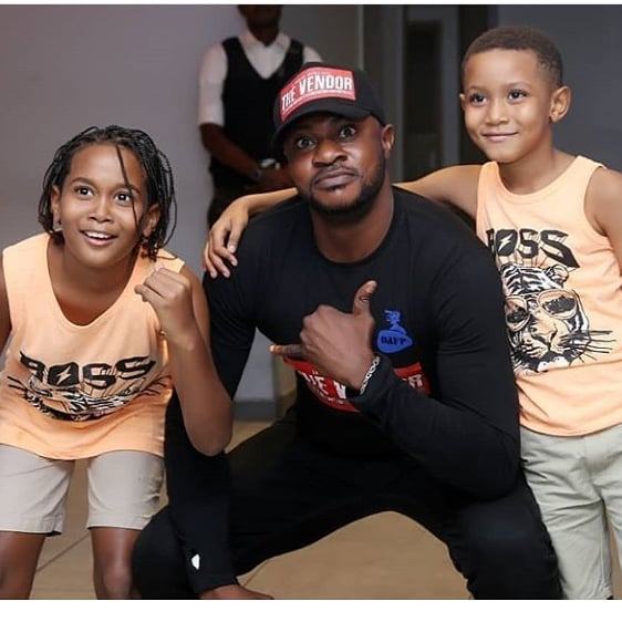 Odunlade Adekola and his kids