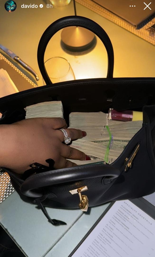 Davido Splashes Dollar Bills On Chioma Ahead Of Her Birthday 3 Davido