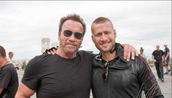 Arnold Schwarzenegger and Glen Powell